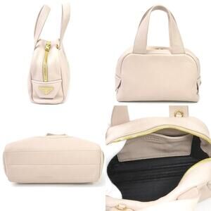 Prada Daino White Handbag Perforated Logo Vitello White